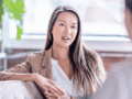Therapist talking to patient in office